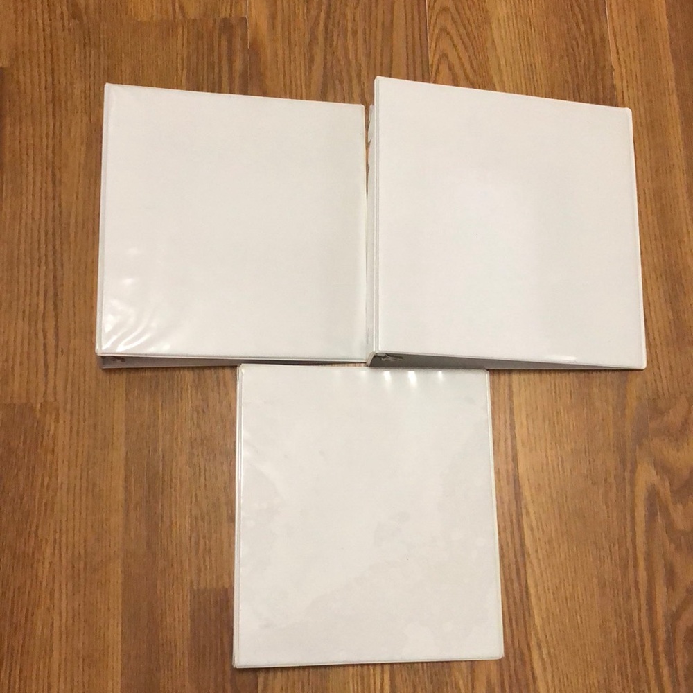 Lot of 3 white 3 ring binders